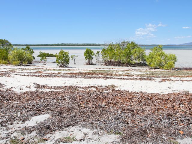 There are sweeping views over calm waters towards Middle Island.