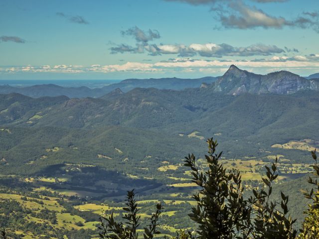 Stop at Toolona lookout for breathtaking views of Mount Warning and Limpinwood Valley.