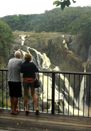 Photo of people looking at Barron Falls from Din Din Barron Falls lookout.
