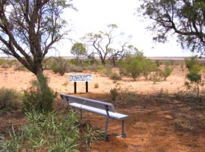 Rest spot and sign on Lake Bindegolly circuit walk. 