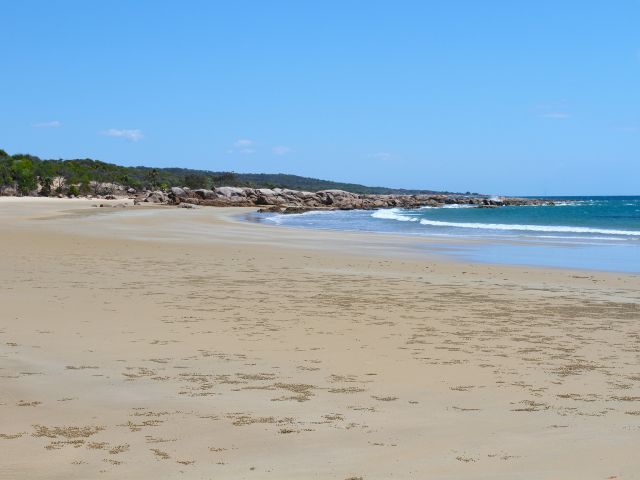 Go for a stroll along the beach or have a look for sea life in the shallow rock pools.