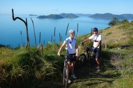 Mountain biking on the Sandy Bay track, South Molle Island. 