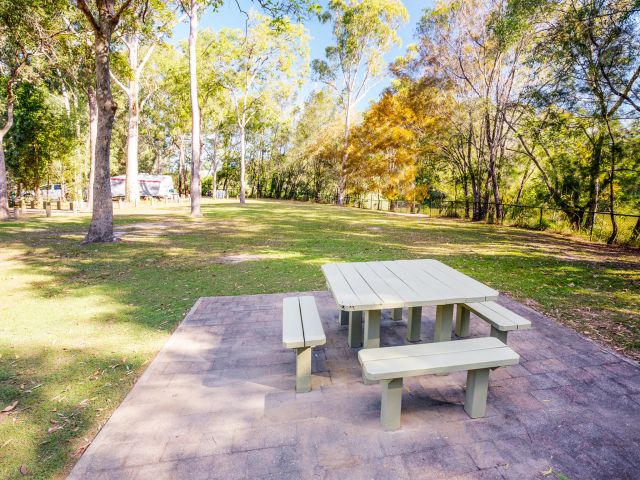 Grab a picnic table or spread out a blanket and enjoy a picnic at Coochin Creek day-use area.