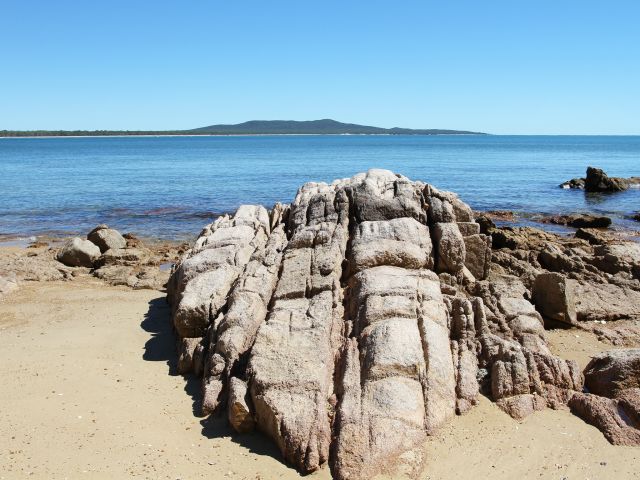 From your camp site, look out over the calm waters of Pancake Creek towards Rodds Peninsula.