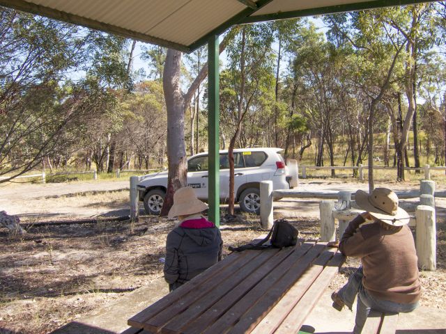 The small Louisa Creek Junction day-use area has a sheltered picnic table.