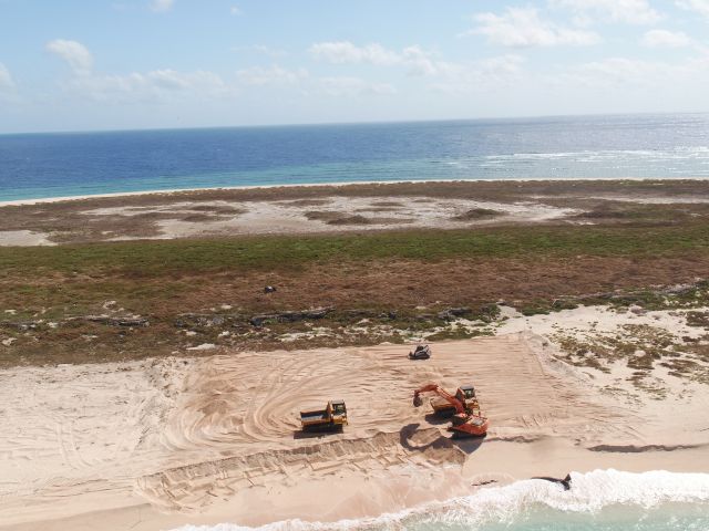 Sand reprofiling works on the southern side of the island.