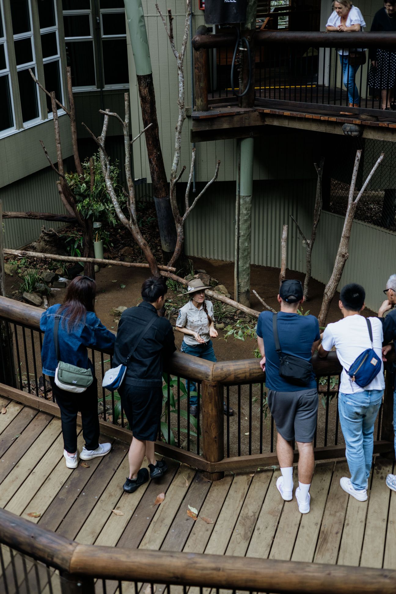 Photo of Wildlife Ranger delivering an educational talk to a group of visitors.