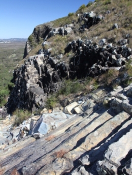 Mount Coolum's cliffs feature distinctive hexagonal-shaped columns of volcanic rock that formed 25-26 million years ago as molten magma cooled, solidified and contracted. 