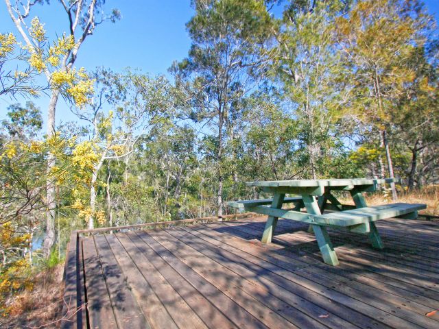 Hoppy Lark's day-use area has a lovely picnic table on a raised timber platform overlooking the Gregory River.