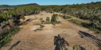 Dirt area cleared of all abandoned building and equipment.