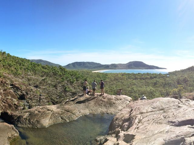 Enjoy stunning views from the top of Zoe Falls on the Thorsborne Trail.