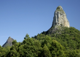 Image of Mount Coonowrin, like other peaks of the Glass House Mountains, is an example of a volcanic plug.