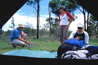 Image of a people setting up camp - minimal impact camping at Moonlight Dam.