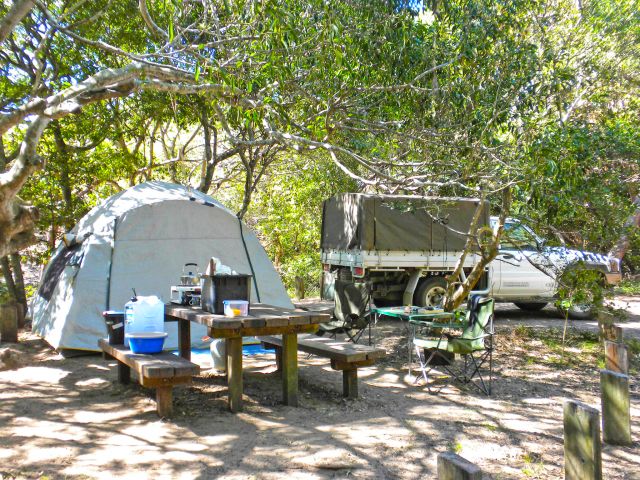 Set up camp next to a picnic table at Wreck Rock camping area.