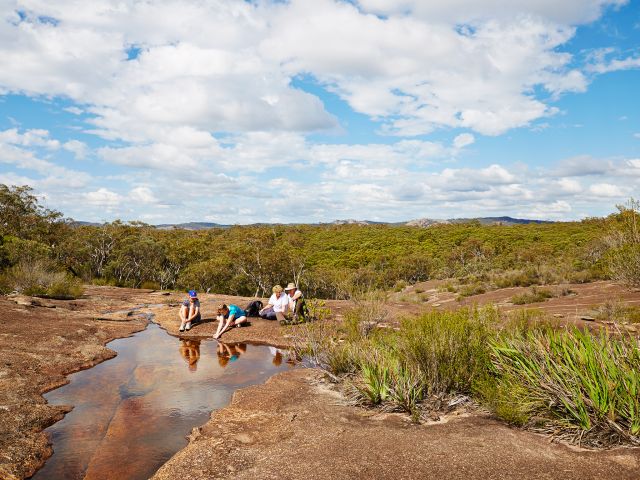 Pass amazing granite outcrops and colourful rock slabs on the Mount Norman walk.
