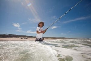 Beach fishing is a popular recreational activity. 