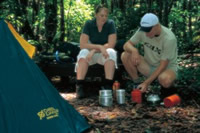 Image of people camping under the stars and away from the crowds in one of the small walkers' camps along the walk. 