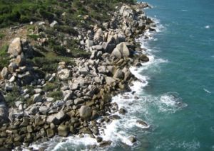 Aerial image of the rocky coastline exposed.