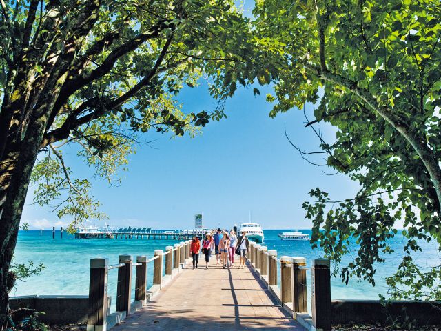Arrive on the island with a long scenic walk along the jetty.