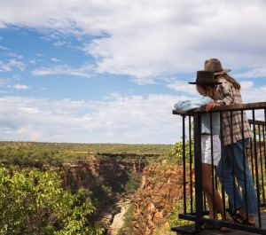 Photo of a couple standing at the edge of Gorge lookout platform