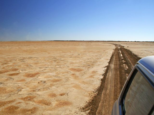 Feel the spaciousness of the outback as you cross the flat claypans.