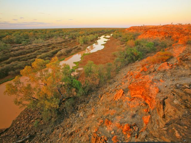 Ancient cliffs glow in the sunset.