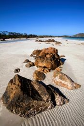 White quartz sand of Chilli Beach. 