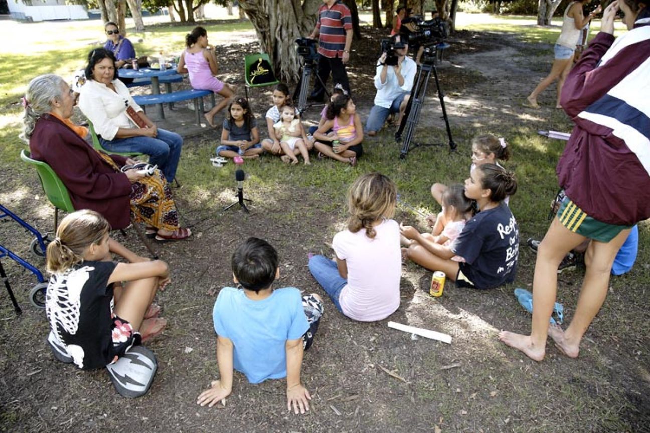 Butchulla children listen as Elders retell their legends.