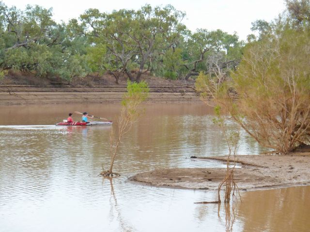 Glide across the Diamantina River in a canoe.