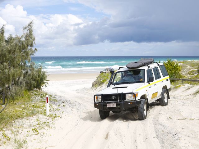 Four-wheel drive on a beach access track on the Northern Island discovery drive.