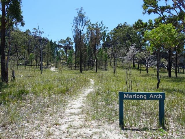 Enjoy a short stroll along the sandy Marlong Arch track.