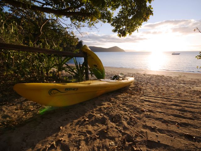 Kayak to your camp site at Dugong Beach camping area on Whitsunday Island.