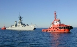 Ex-HMAS Brisbane under-tow. 
