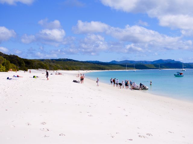 Relax on the sand at Whitehaven Beach day-use area.