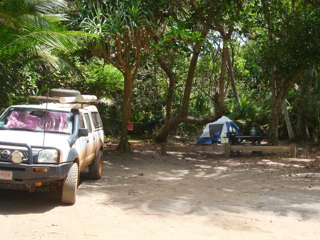 Enjoy a shady camp site a few metres from Chilli Beach.