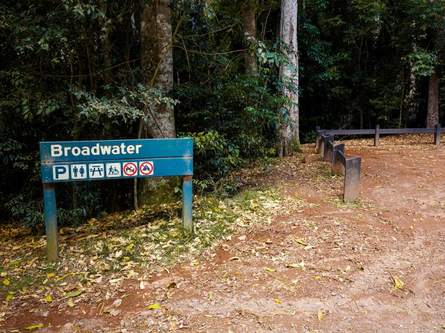 Photo of the Broadwater sign. The small day-use area has a toilet and picnic tables.