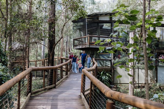 Photo of family departing Daisy Hill Koala Centre front gate.