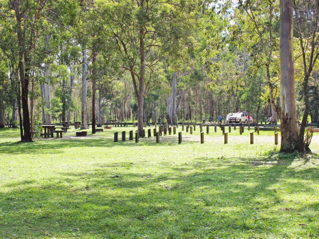 Grassy sites and shady trees await!
