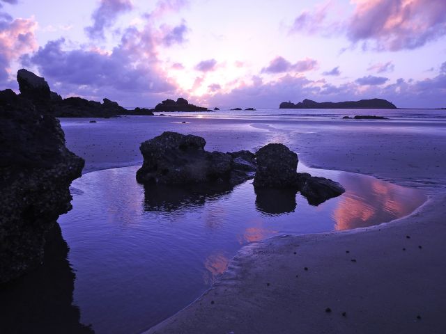 At low tide, you can return to the day-use area along the scenic beach.