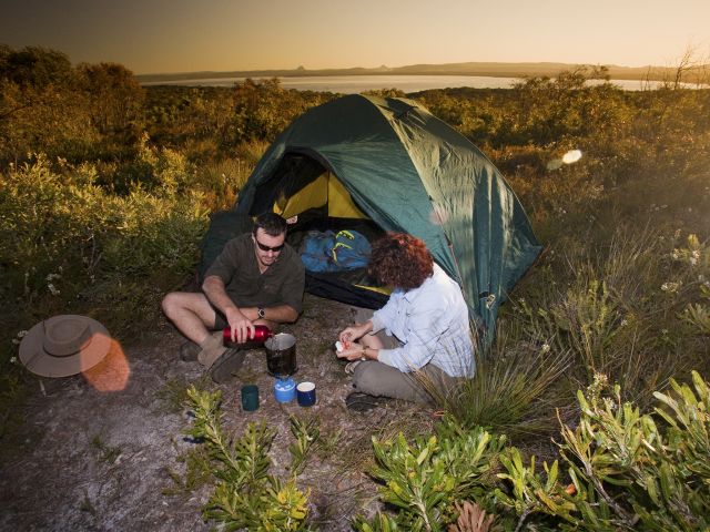 Rest up at the Brahminy walkers’ camp along the Cooloola Great Walk and take in views of Lake Cootharaba.