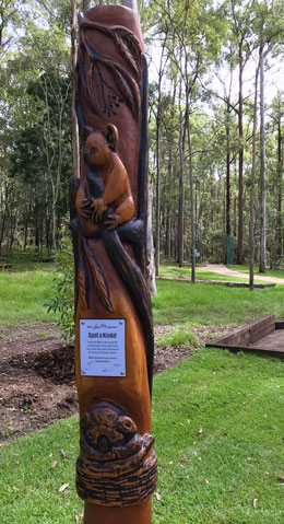 A carved koala statue.