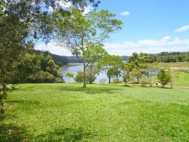 Camp at the grassy Kauri Creek camping area beside an inlet of Lake Tinaroo.