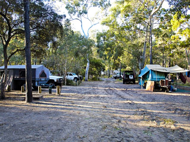 Pitch your tent or camper trailer at the shady Burrum Point camping area.
