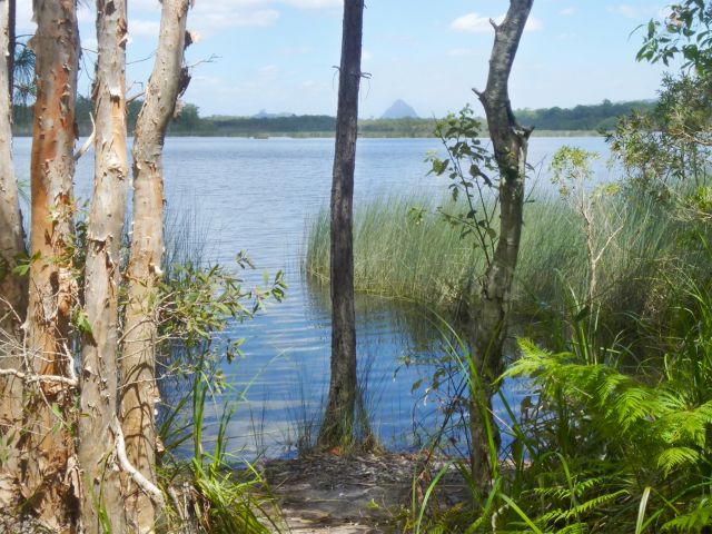 Riders can stop along the Ewen Maddock mountain bike trail and enjoy scenic views of the dam and Mount Beerwah.