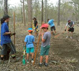 Fraser Coast Mountain Bike Club members working together to build the Toogoom mountain bike trails. 