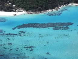 Image of Lizard Island which is surrounded by fringing reefs such as Loomis Reef.