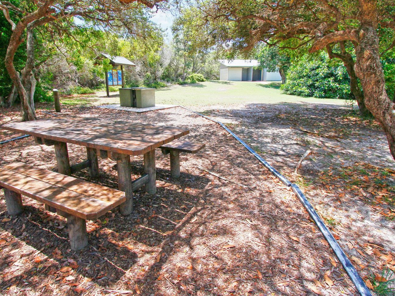 Photo of shady picnic table